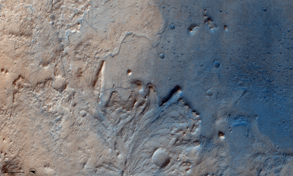 Jezero crater that was selected as the landing site for NASA’s Mars 2020 rover, Perserverance. The crater contains this fan-delta deposit which is rich in clays. Note the sinuous channel to the east.
